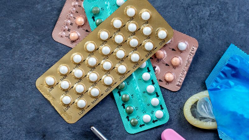 Choosing method of contraception : Birth control pills, an injection syringe and condom,IUD-method